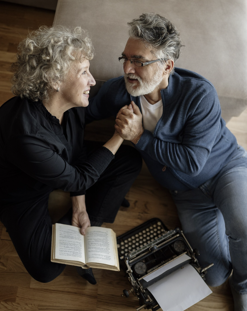 Older couple sharing a warm, connected moment at home